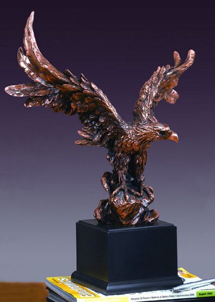 Eagle sculpture standing on rocks